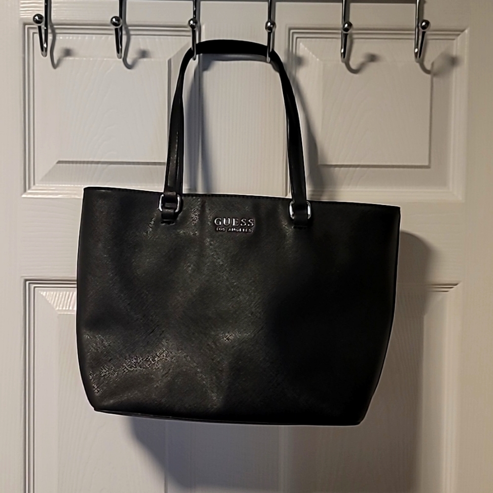 Guess, 15x10 black purse.
